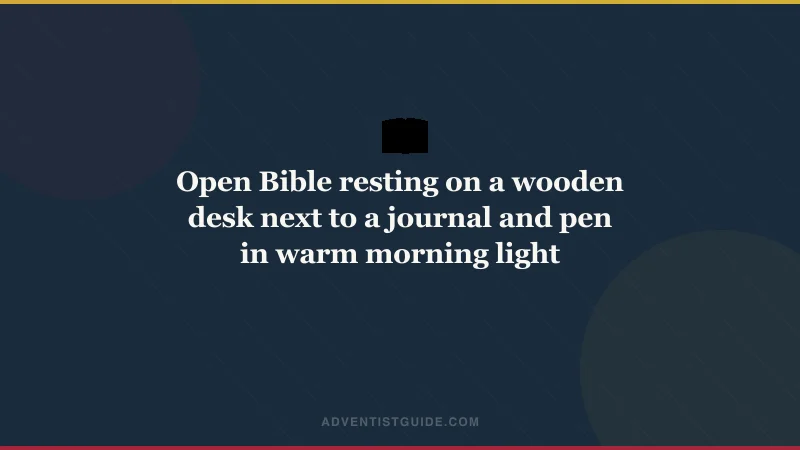 Open Bible resting on a wooden desk next to a journal and pen in warm morning light