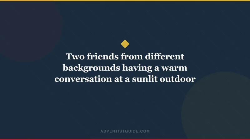 Two friends from different backgrounds having a warm conversation at a sunlit outdoor table