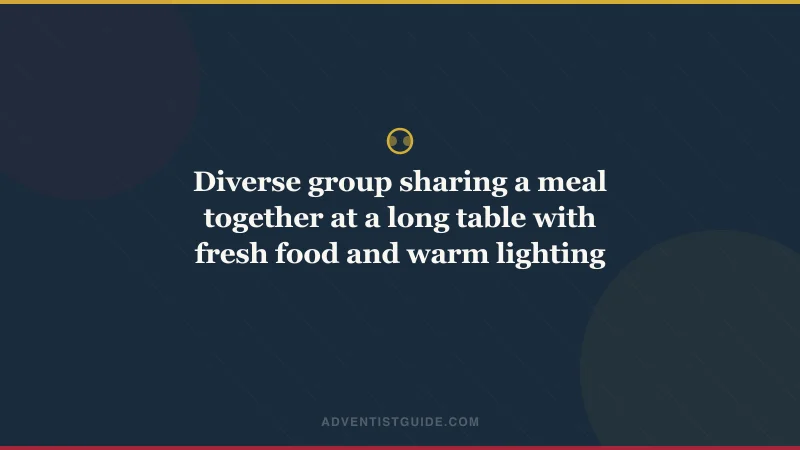 Diverse group sharing a meal together at a long table with fresh food and warm lighting